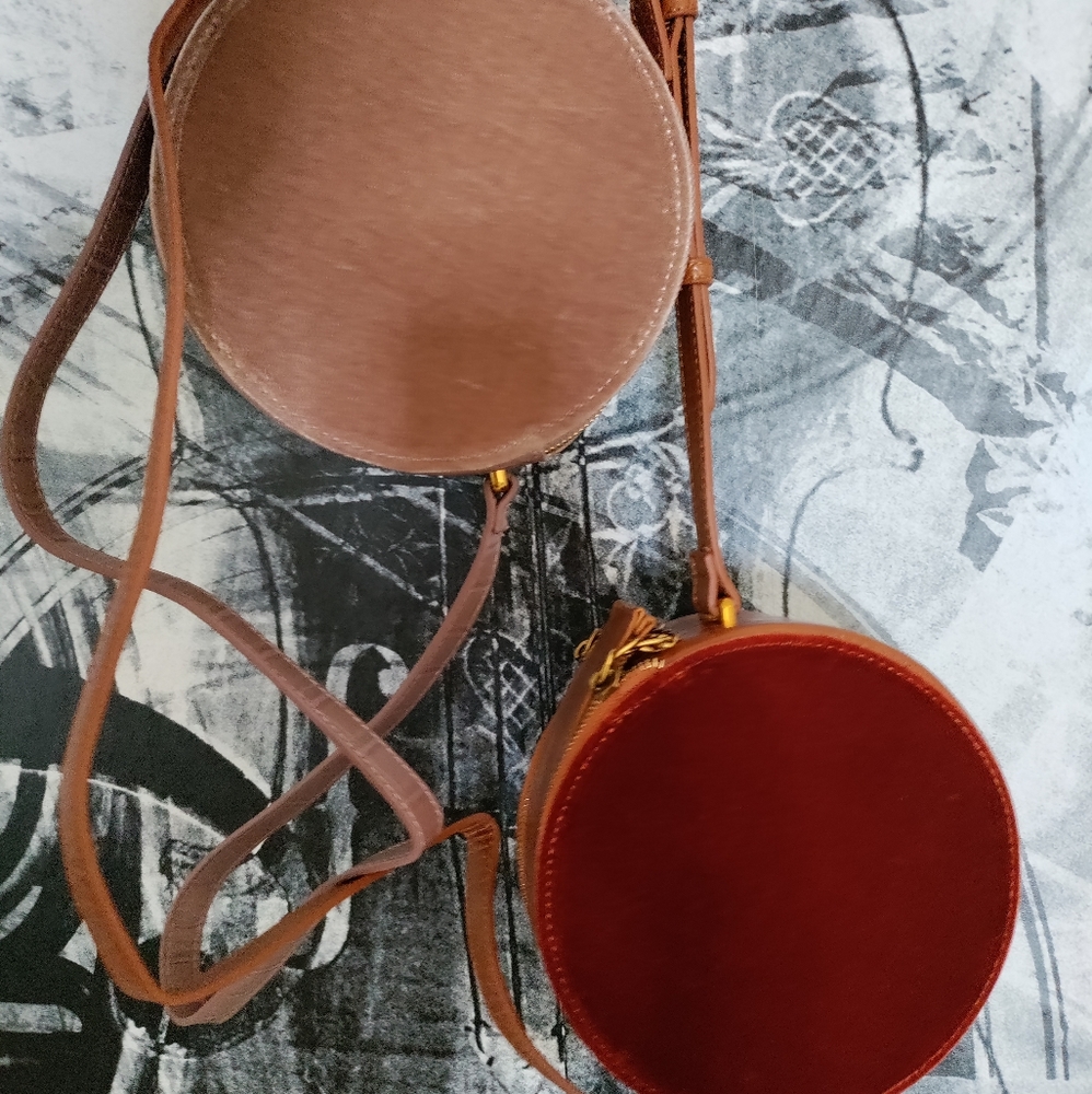 Round cross body bags